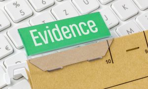 A label with the word 'evidence' on top of a case folder for claims for personal injuries.