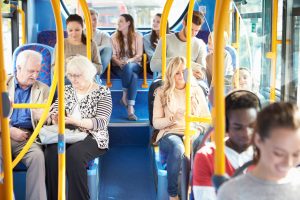 People sat inside a bus.