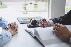 A personal injury solicitor helping a client with a bus injury claim