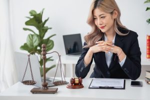 Medical negligence solicitor sat at desk, working on endometriosis calculator claim.